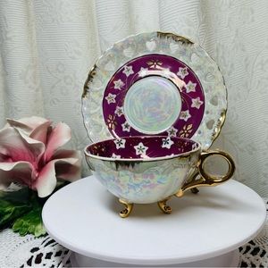 Lusterware Tea Cup And Saucer Set, white, burgandi and gold color made in Japan.